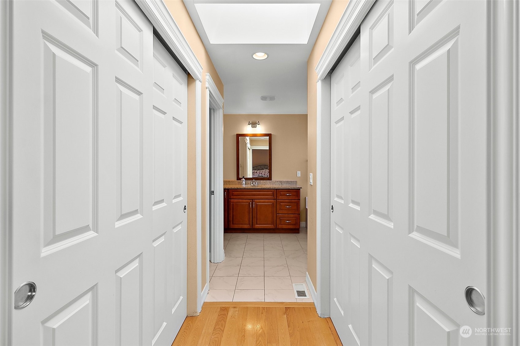 9604 South 236th Place Kent, WA 98031 - Photo 26 of 39 a view of a hallway to a livingroom with furniture