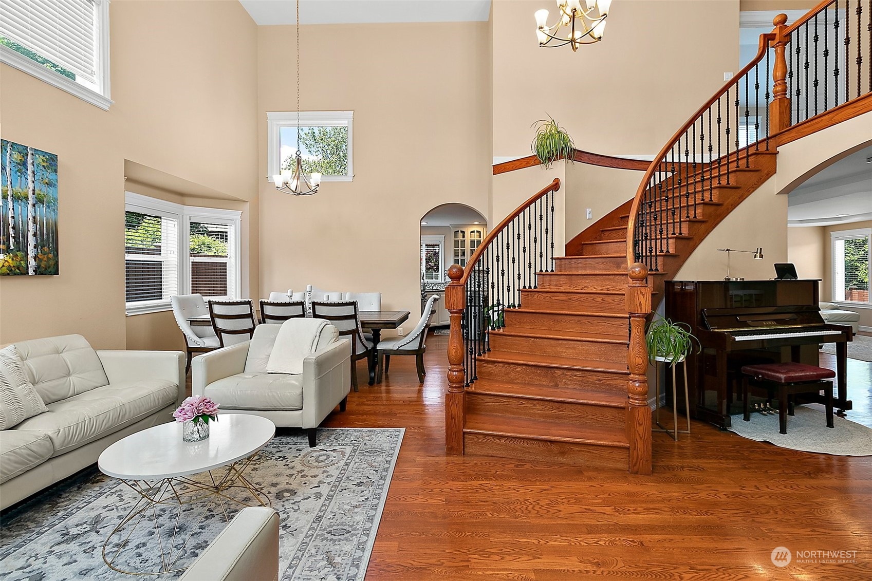 9604 South 236th Place Kent, WA 98031 - Photo 3 of 39 a living room with furniture and stairs