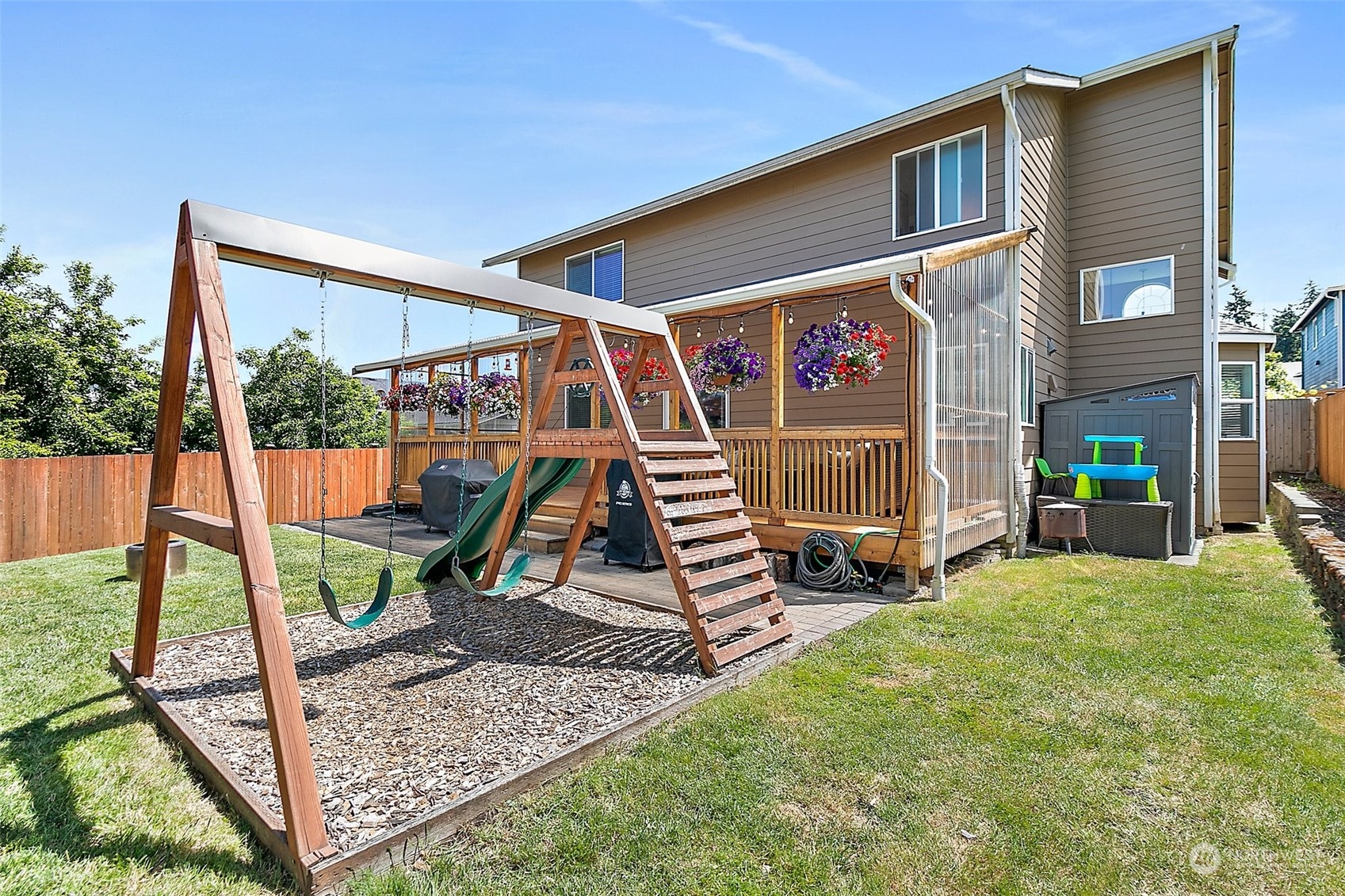 9604 South 236th Place Kent, WA 98031 - Photo 32 of 39 a view of outdoor space and deck