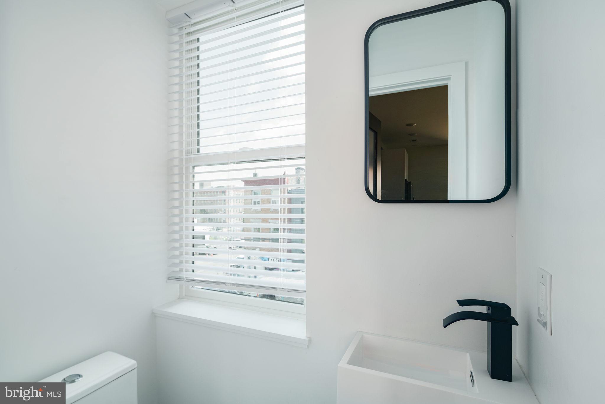 930 North 2nd Street, Unit 3 Philadelphia, PA 19123 - Photo 11 of 20 a bathroom with a tub and a window