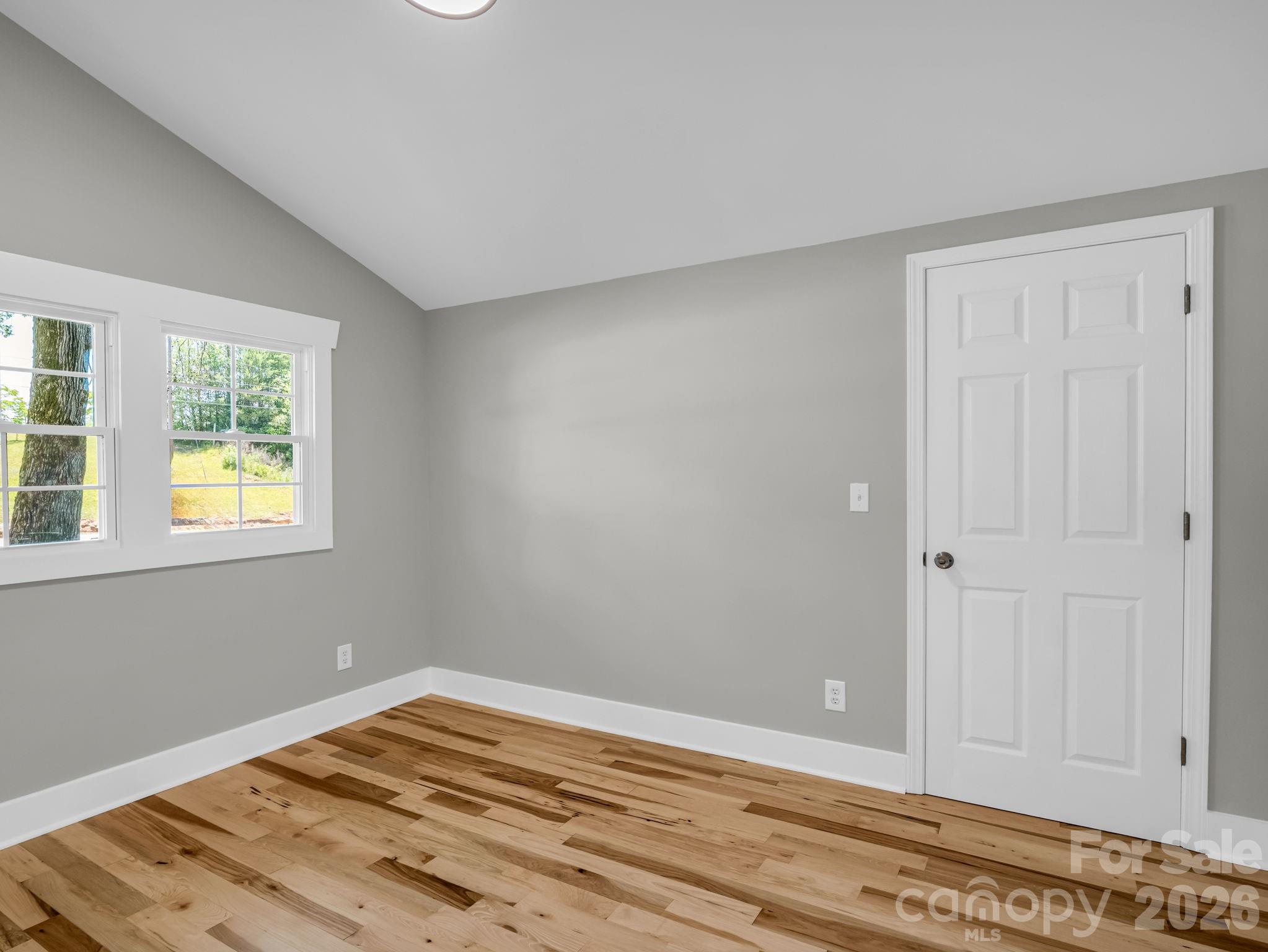 5923 Highway 14 Landrum, SC 29356 - Photo 10 of 15 a view of a room with wooden floor and closet