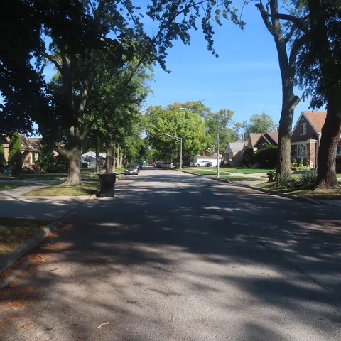 a view of street with houses