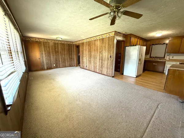 a view of a livingroom with a staircase