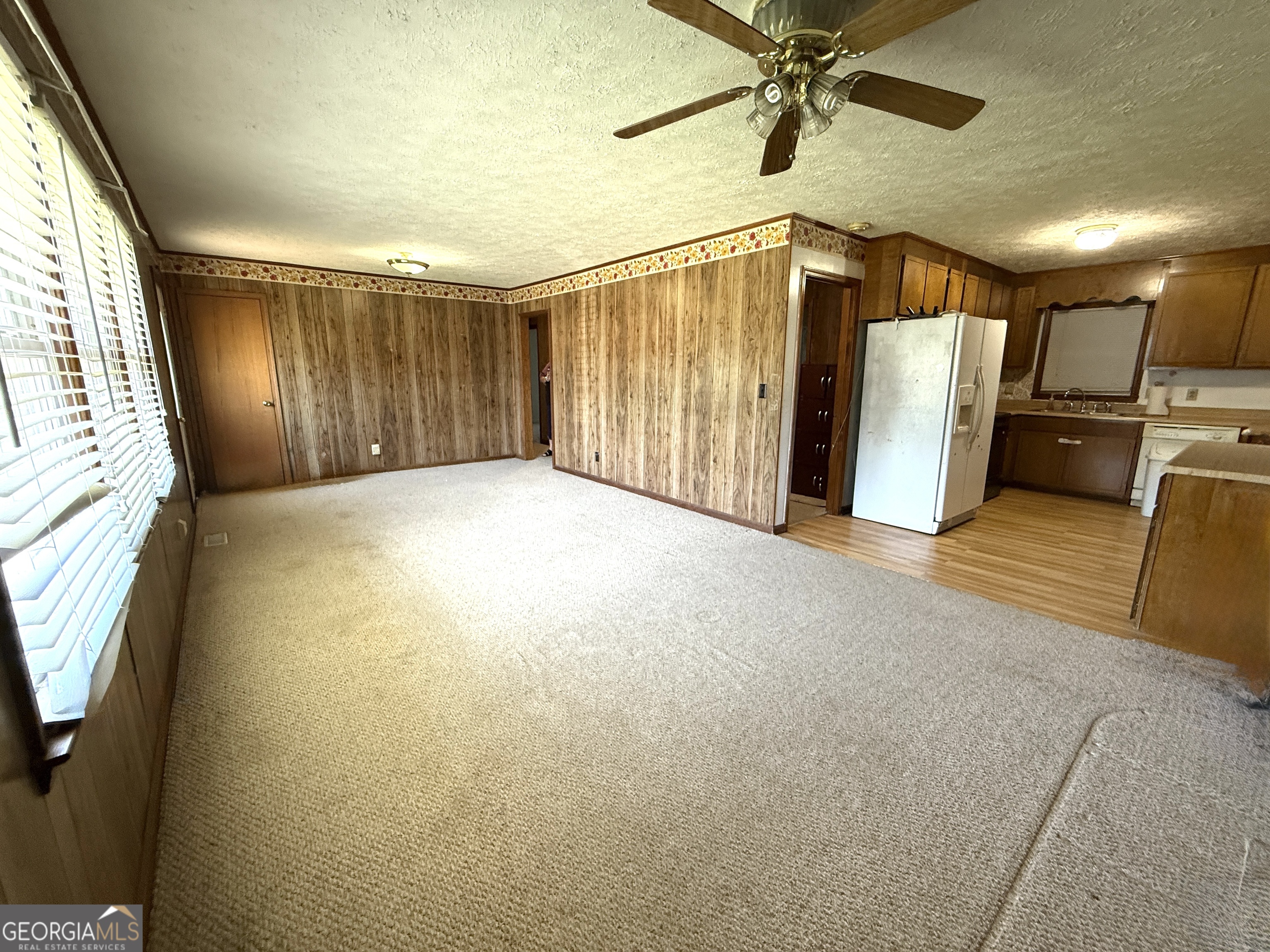 140 Rene Lane Cochran, GA 31014 - Photo 11 of 29 a view of a livingroom with a staircase