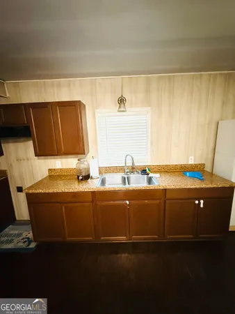 a view of cabinets with sink