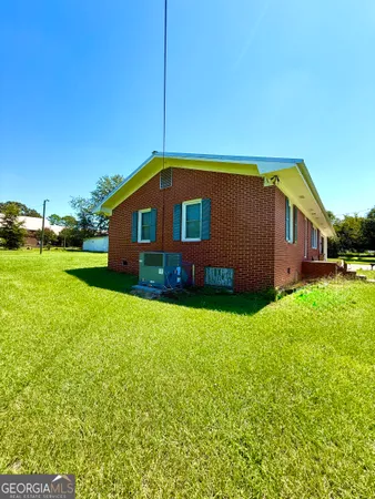 a blue house with outdoor space