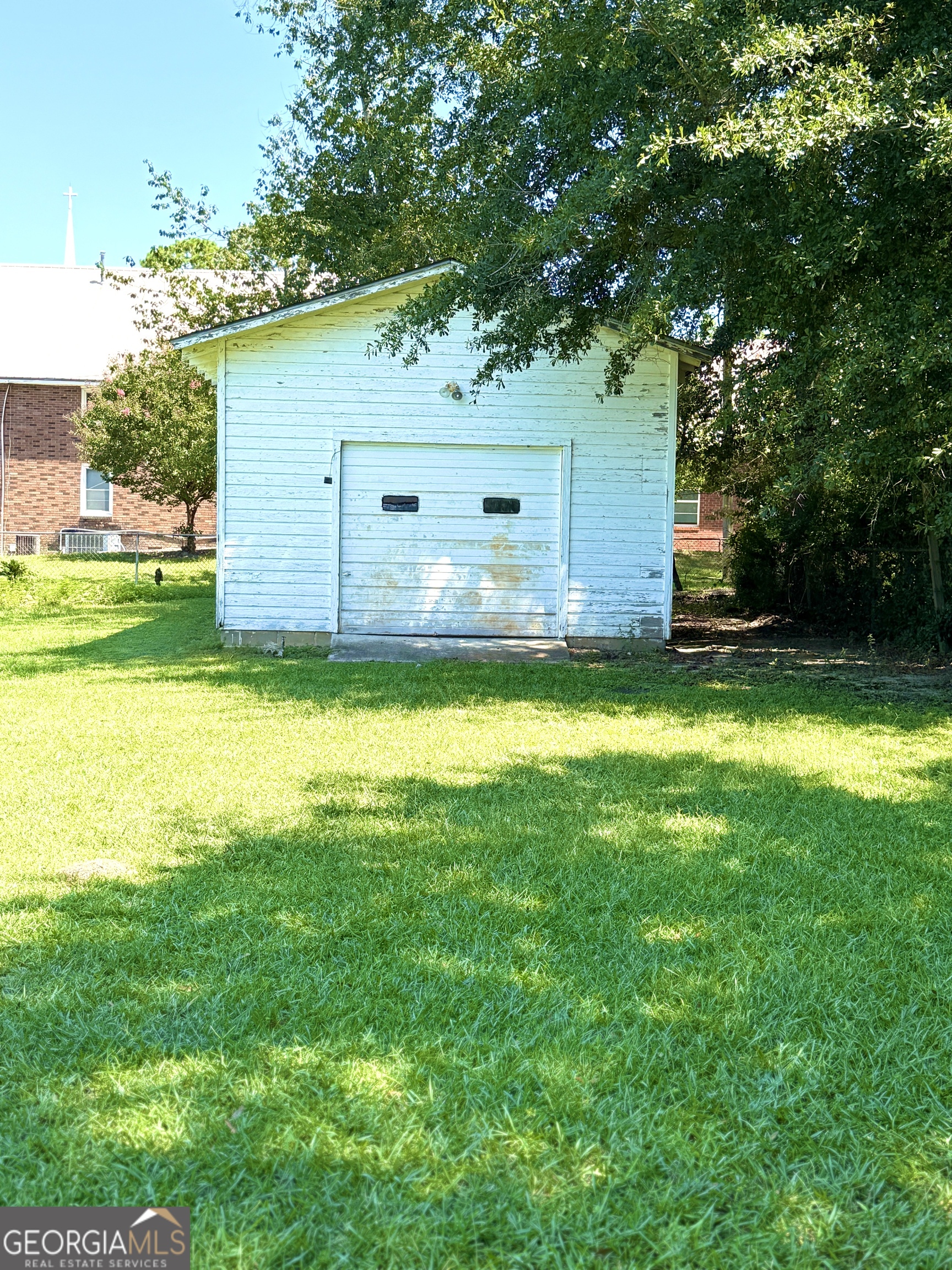 140 Rene Lane Cochran, GA 31014 - Photo 7 of 29 a view of a house with a yard