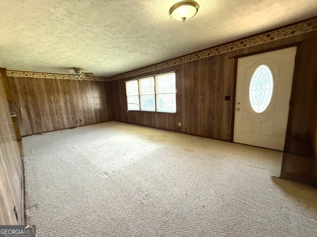 an empty room with windows