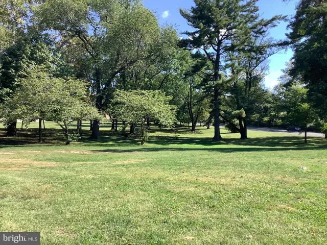 a kitchen with a sink cabinets and appliances