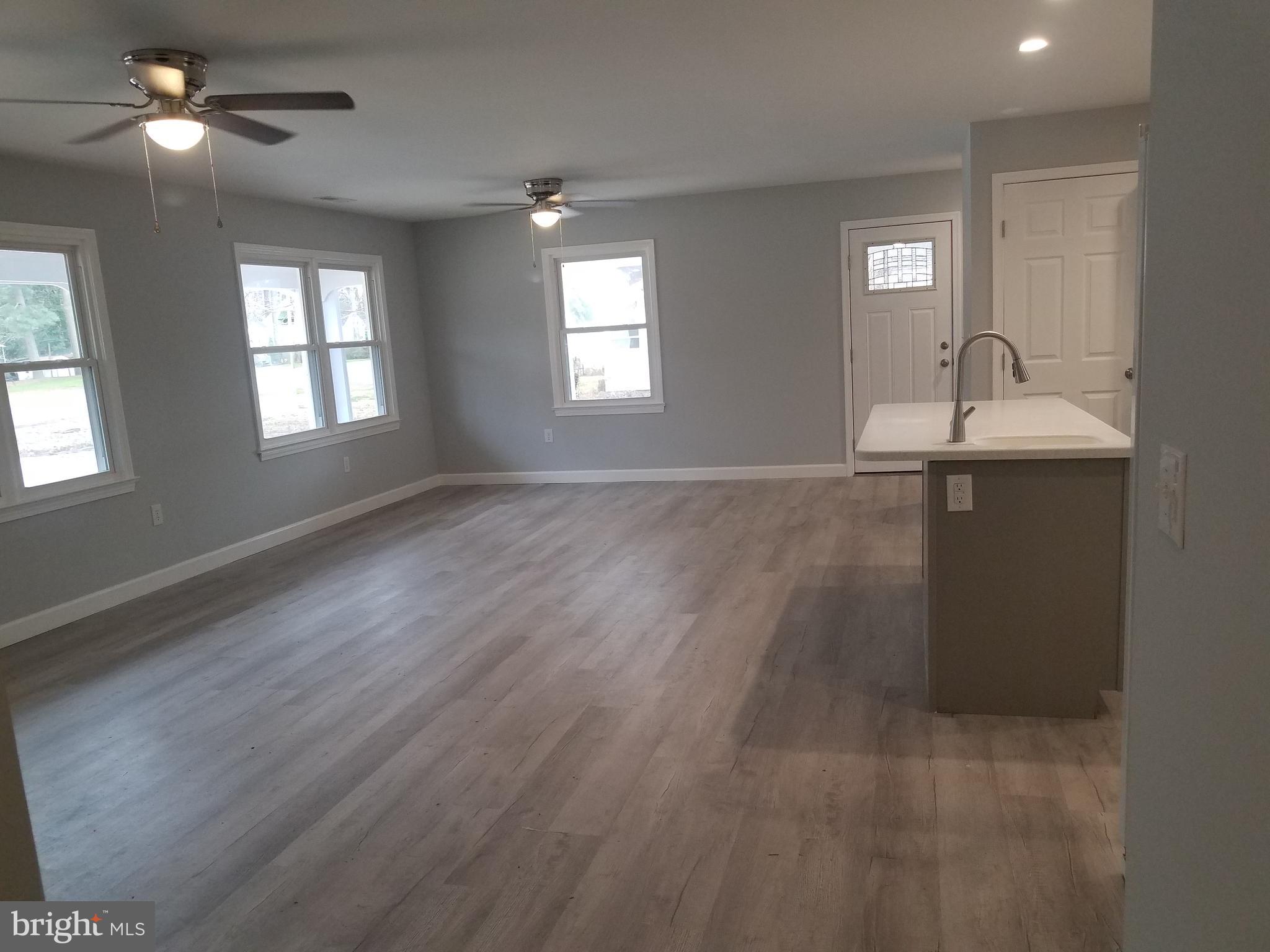 2123 Bypass Road Pocomoke City, MD 21851 - Photo 19 of 30 Huge open family room, dining room combo.