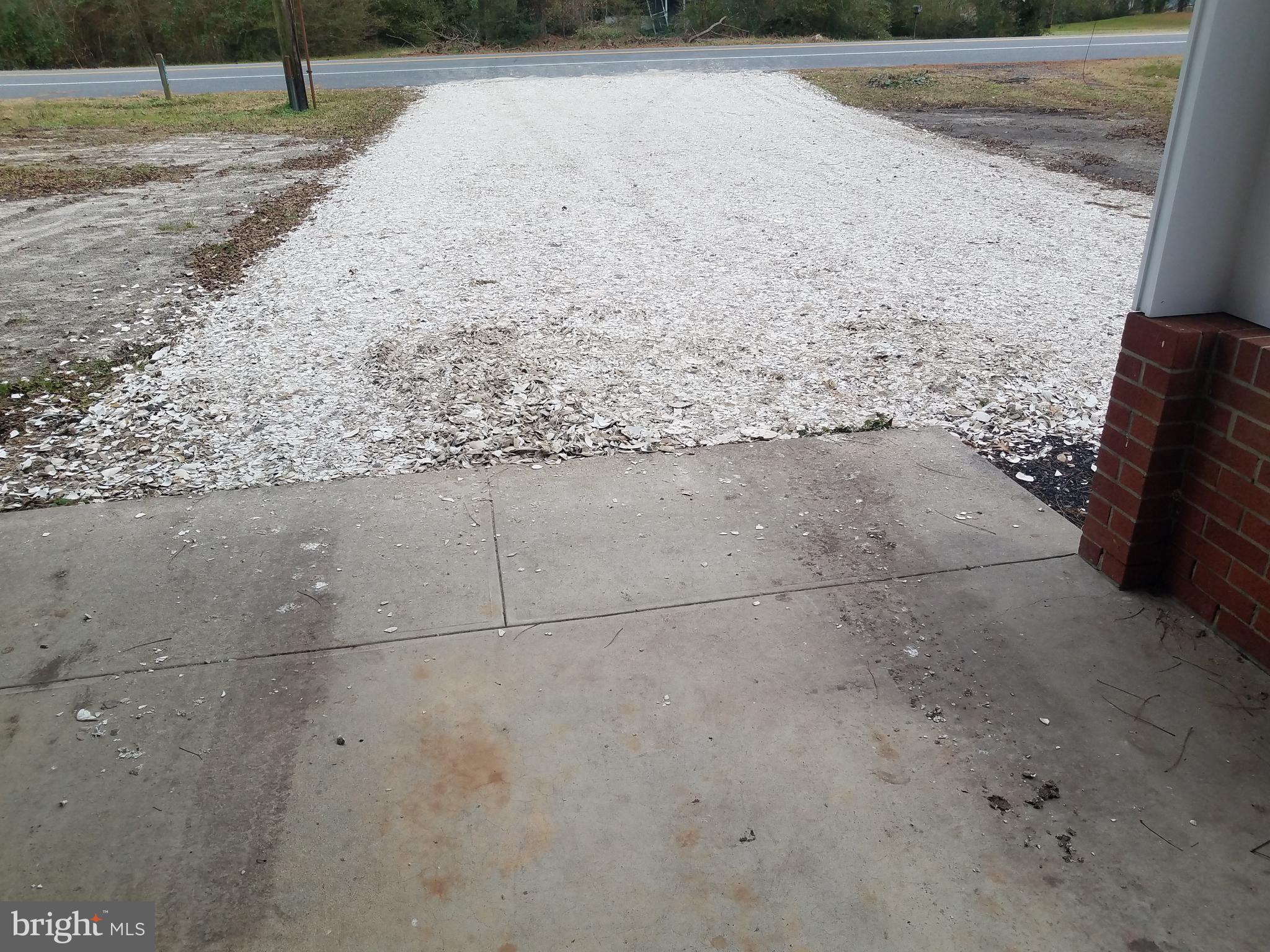 2123 Bypass Road Pocomoke City, MD 21851 - Photo 4 of 30 Natural clam shell extra wide driveway.