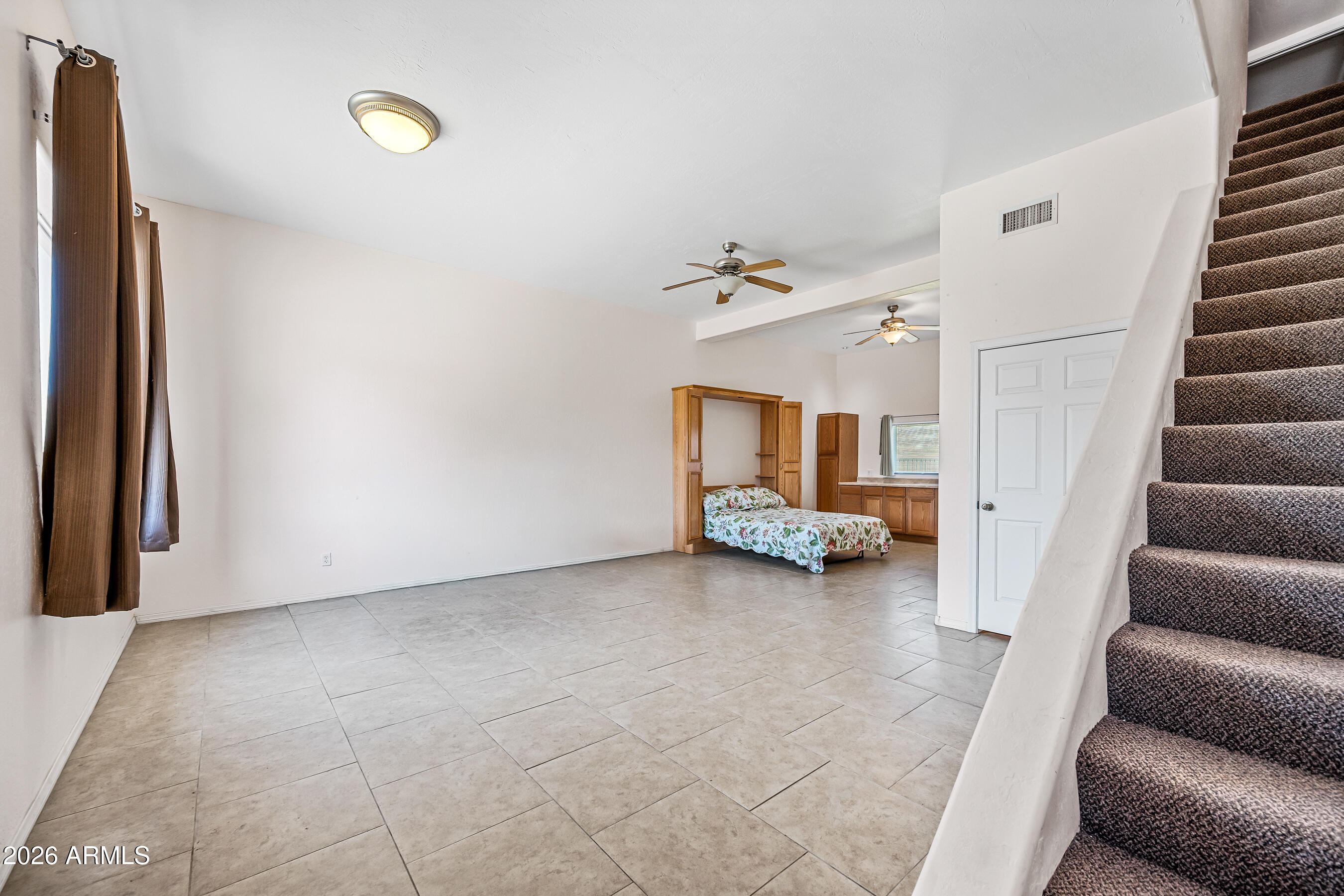 322 East Redfield Road Chandler, AZ 85225 - Photo 31 of 50 a view of livingroom with furniture and a ceiling fan