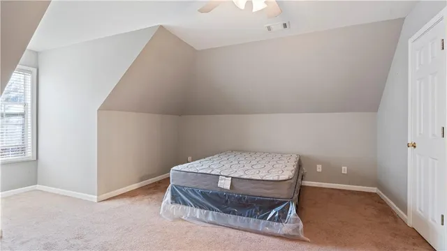 a room with a table and chairs