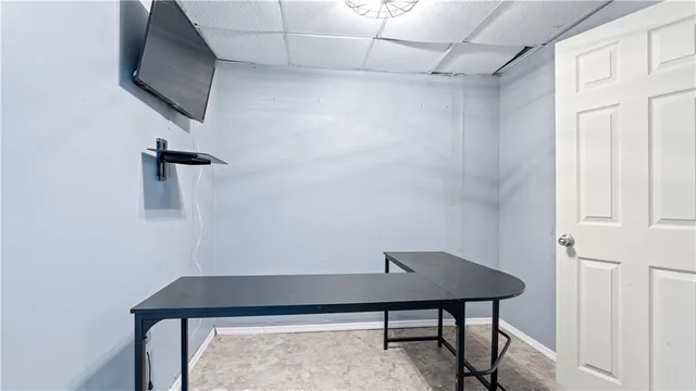 a room with a table and chairs