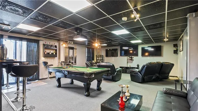 a living room with furniture and a table