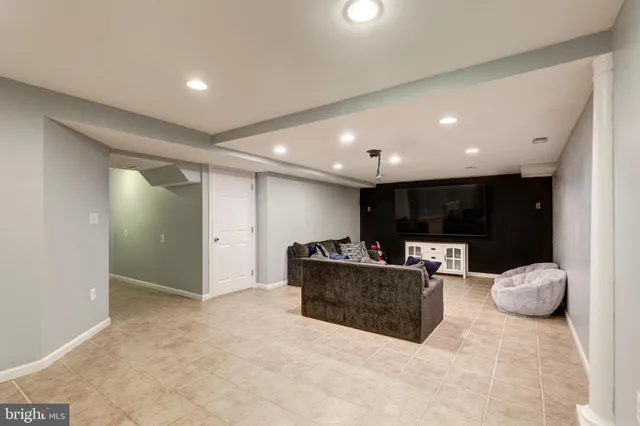 a living room with furniture and a couch