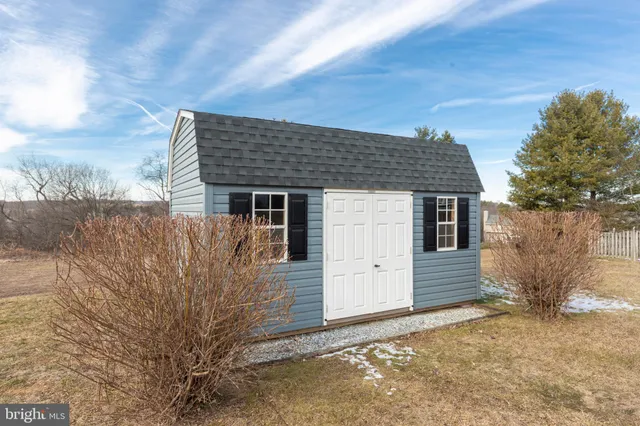 a view of a house with a big yard