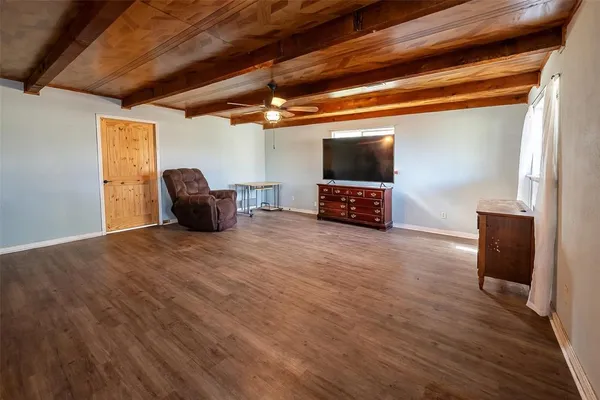 a view of livingroom with furniture and a flat screen tv