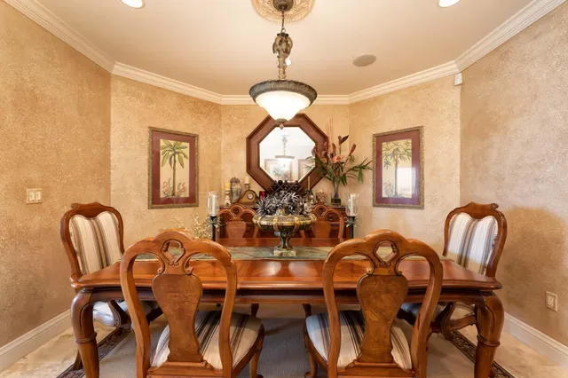 a outdoor living room with furniture and a window