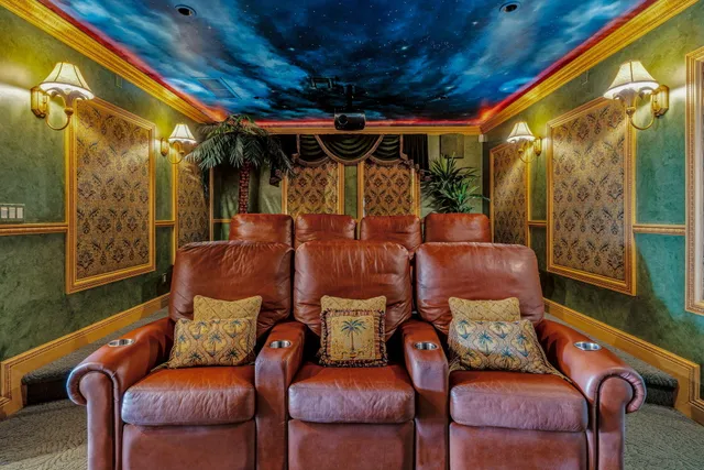 a swimming pool with outdoor seating and yard