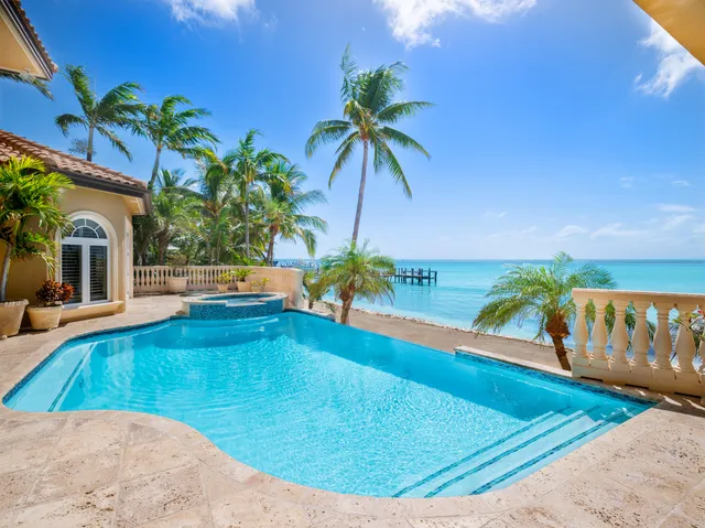 a view of living room with furniture and wooden floor