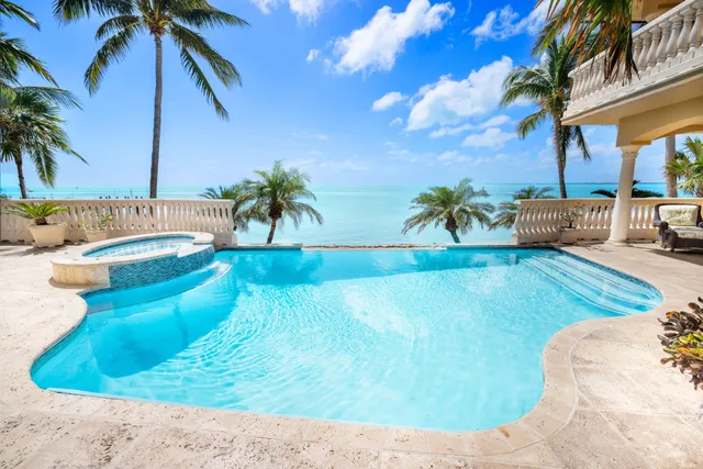 a view of living room filled with furniture and flower