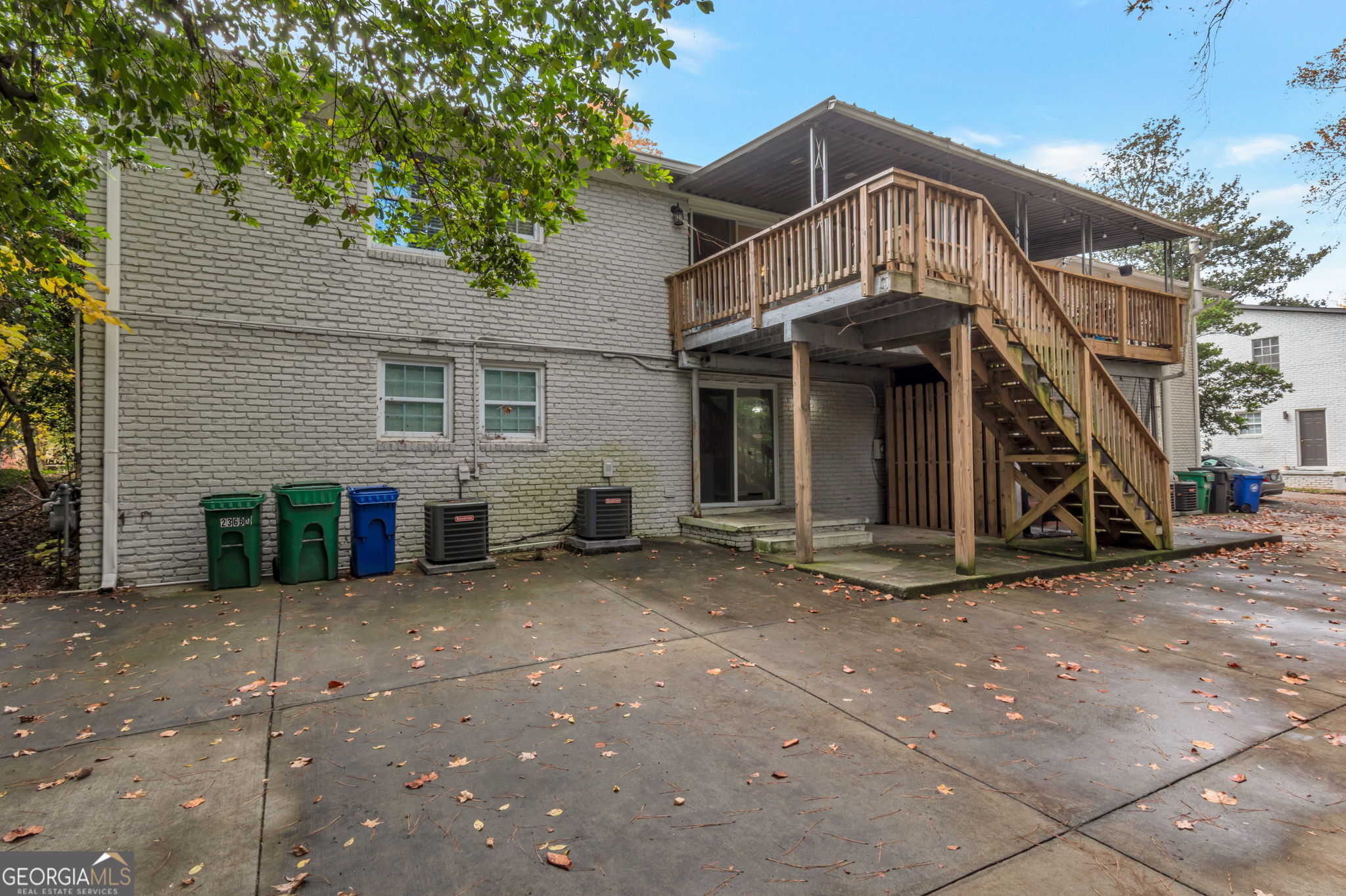 2364 Peachwood Circle Northeast, Unit 2366B Atlanta, GA 30345 - Photo 15 of 15 a view of a house with a yard