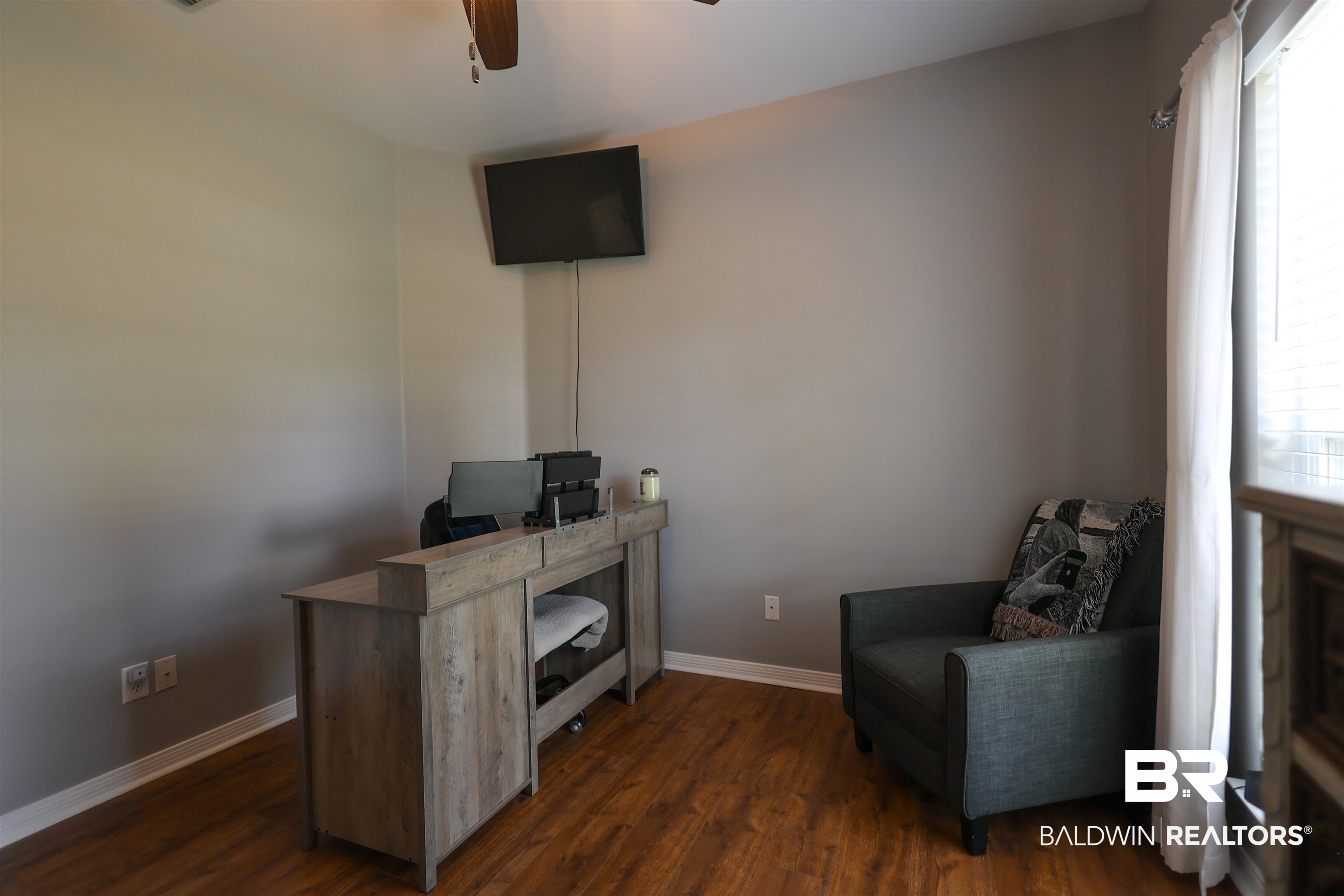 5151 Beatrice Road Gulf Shores, AL 36542 - Photo 35 of 50 Office space with ceiling fan and dark wood-style floors