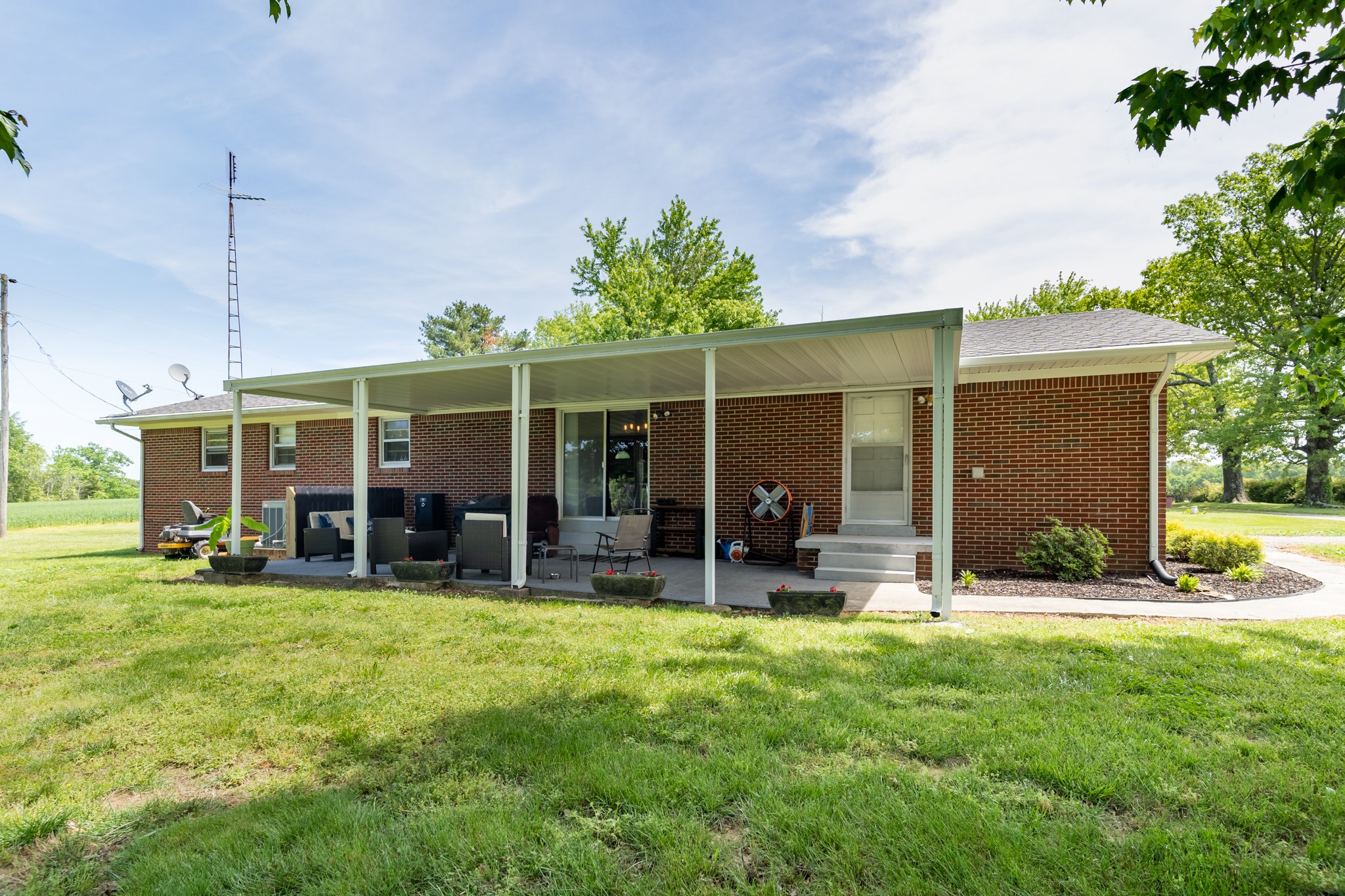 153 Westside Road Lawrenceburg, TN 38464 - Photo 14 of 37 a view of a house with a yard and sitting area