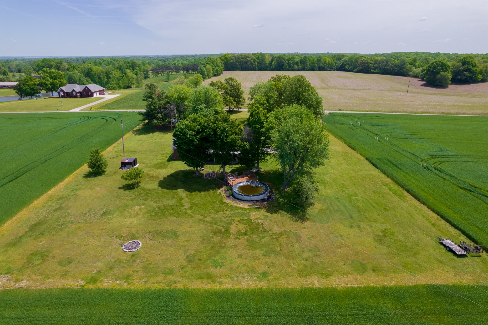 153 Westside Road Lawrenceburg, TN 38464 - Photo 17 of 37 a view of a lake with a yard