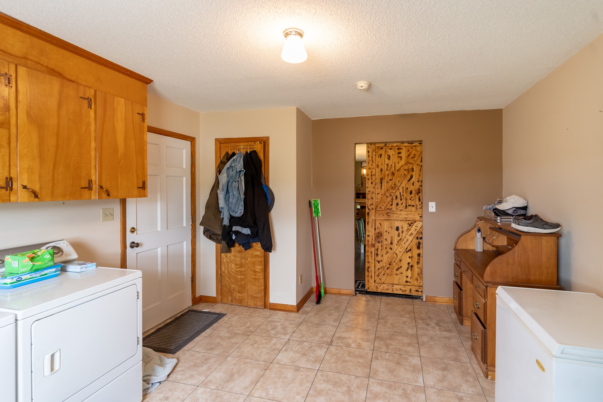 153 Westside Road Lawrenceburg, TN 38464 - Photo 24 of 37 a view of a storage & utility room with closet and windows