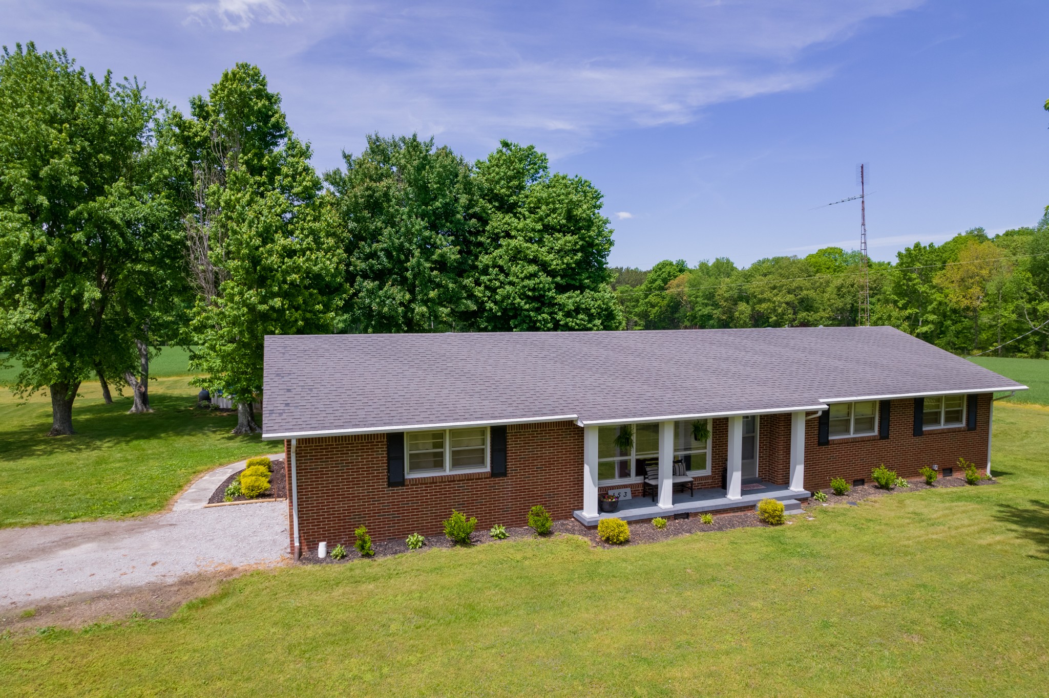 153 Westside Road Lawrenceburg, TN 38464 - Photo 4 of 37 an aerial view of a house with swimming pool and garden