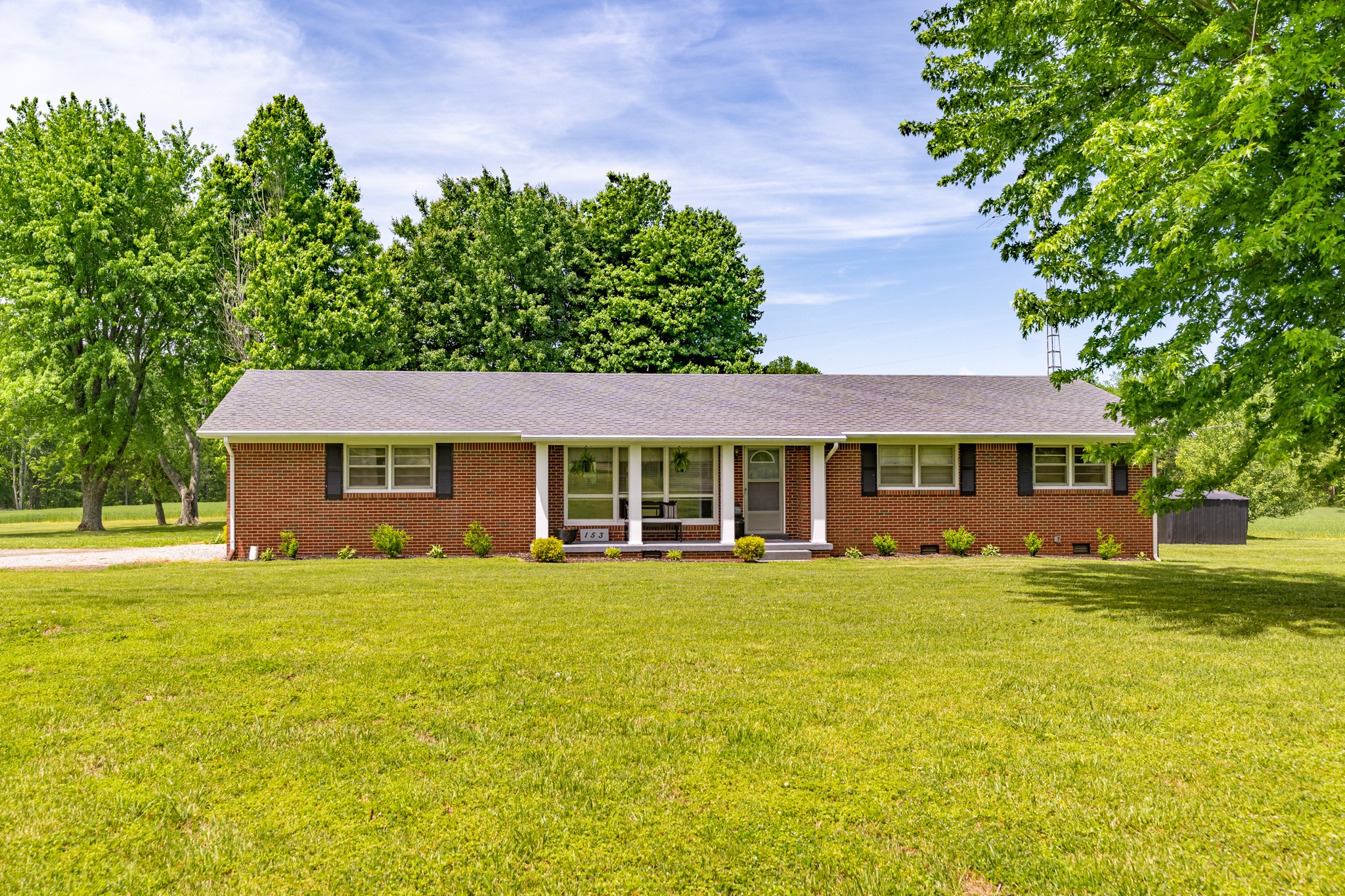 153 Westside Road Lawrenceburg, TN 38464 - Photo 7 of 37 a view of a house with a yard