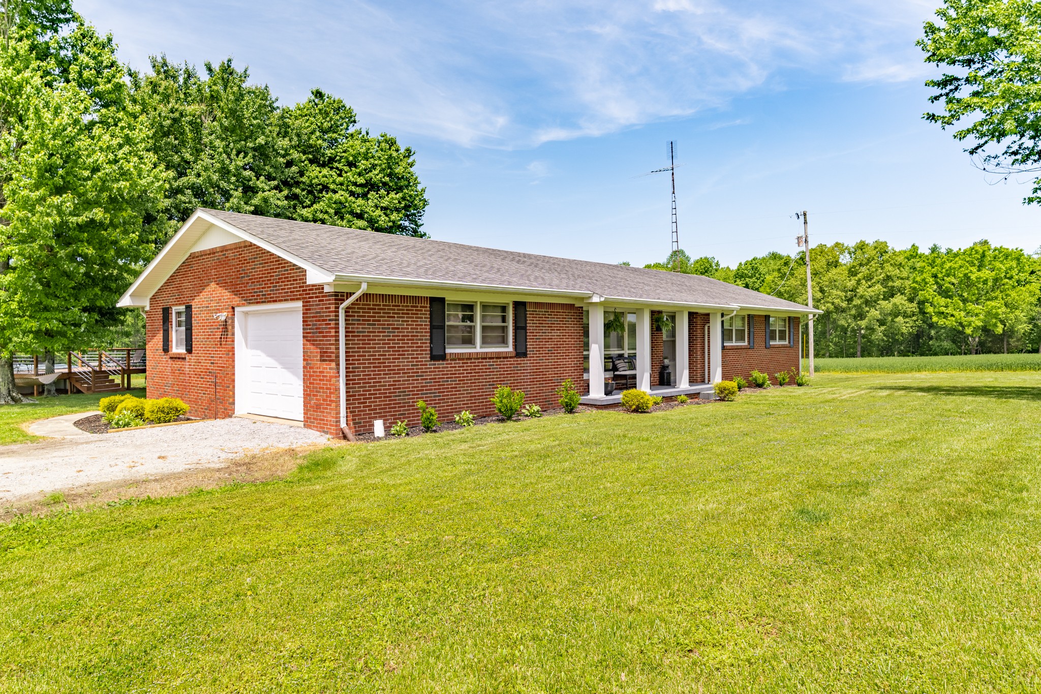 153 Westside Road Lawrenceburg, TN 38464 - Photo 8 of 37 a front view of a house with a garden