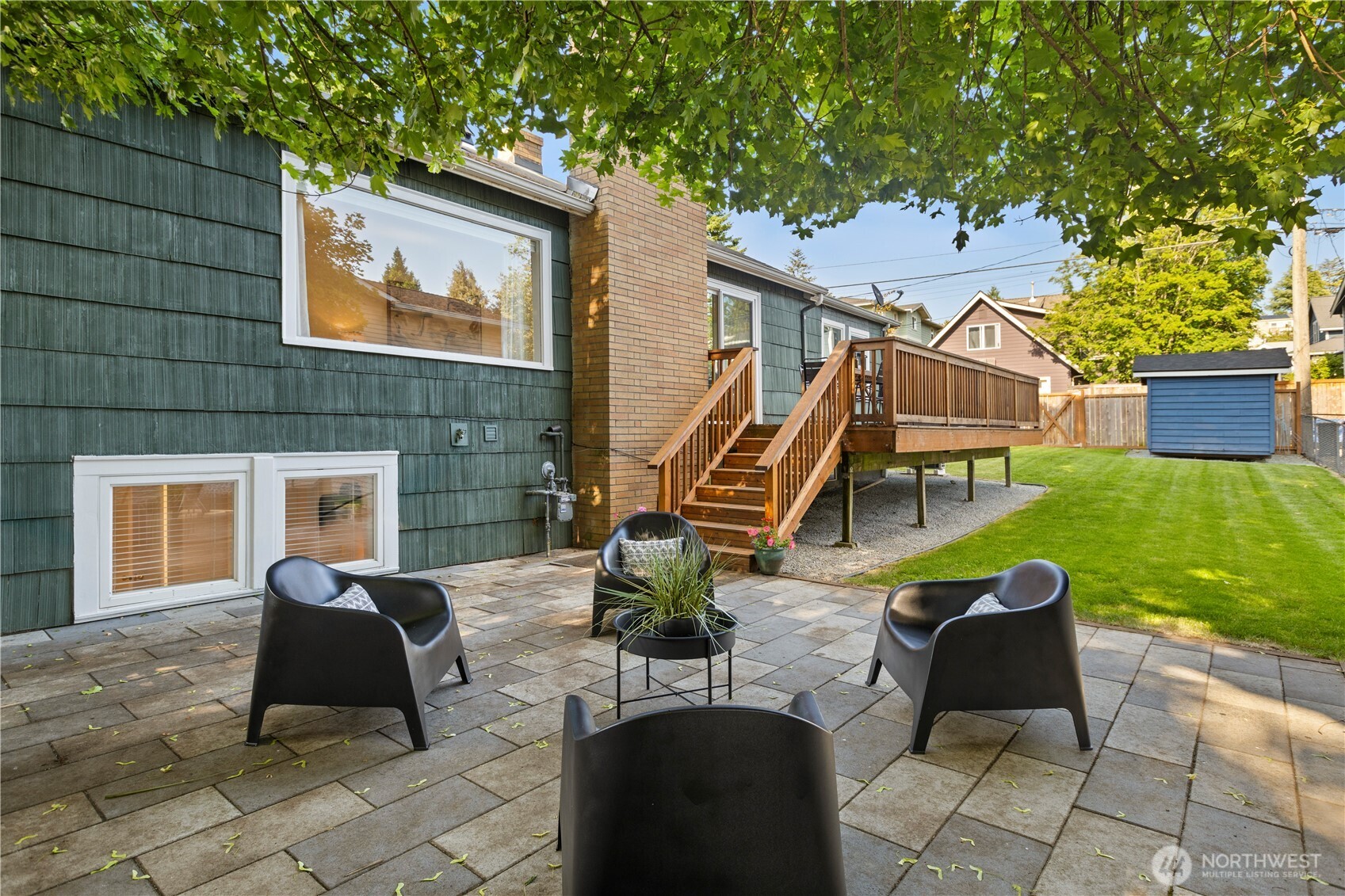 4146 47th Avenue Southwest Seattle, WA 98116 - Photo 31 of 40 a view of a patio with couple of chairs