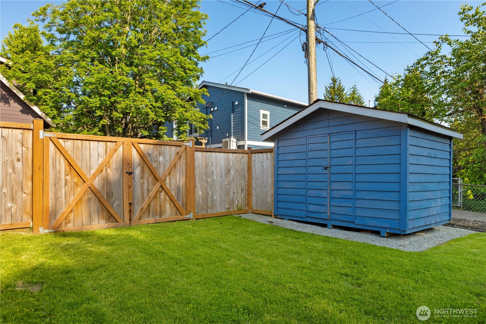 4146 47th Avenue Southwest Seattle, WA 98116 - Photo 35 of 40 a view of a backyard with potted plants