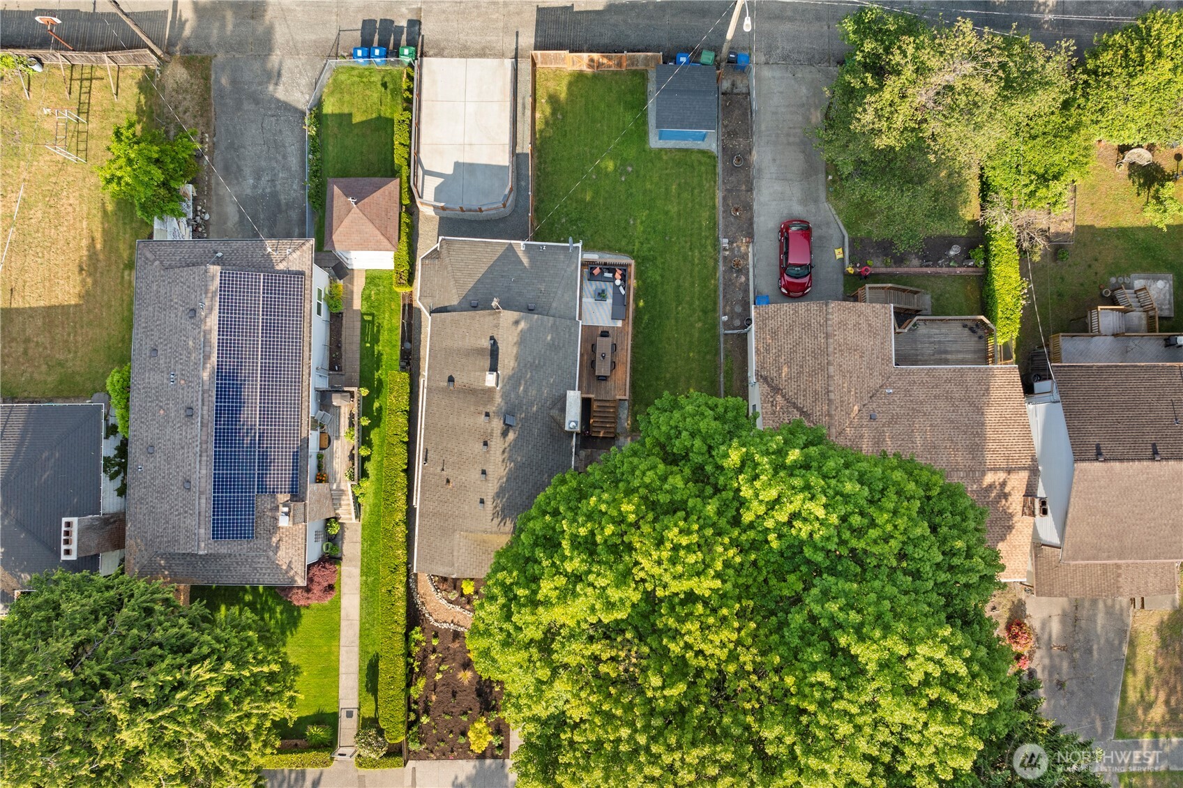 4146 47th Avenue Southwest Seattle, WA 98116 - Photo 38 of 40 an aerial view of a house with a yard