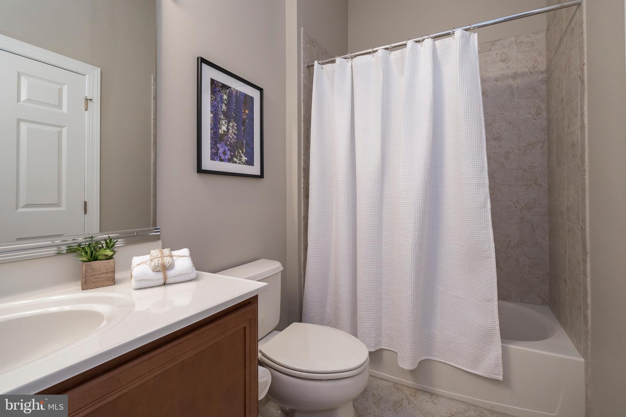 184 Sloan Road Phoenixville, PA 19460 - Photo 22 of 34 Hall Bath with tiled tub