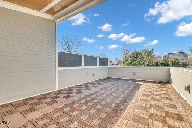 a view of a backyard of the house