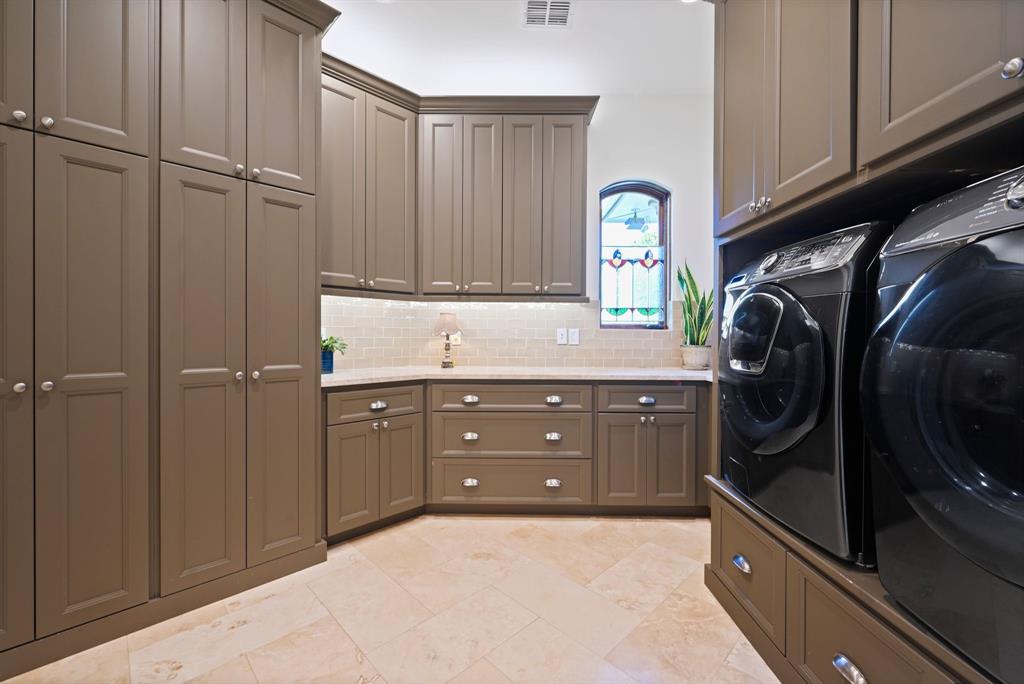 325 River Ridge Spring Branch, TX 78070 - Photo 28 of 40 a kitchen with a refrigerator and cabinets