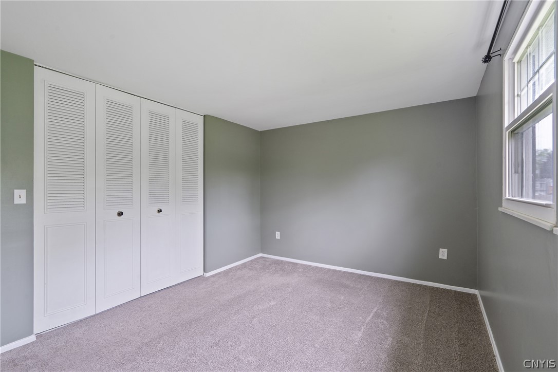 114 Saltwell Road Salina, NY 13090 - Photo 22 of 27 And double bi-fold doors on the closet mean you have ample space to store all of your seasonal clothing.