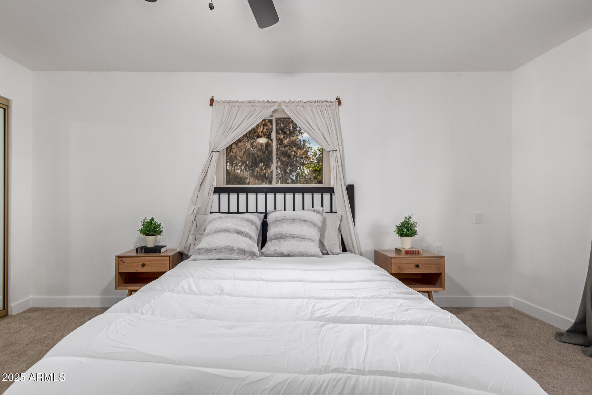 628 Leisure World Mesa, AZ 85206 - Photo 17 of 51 a bedroom with a bed and a window