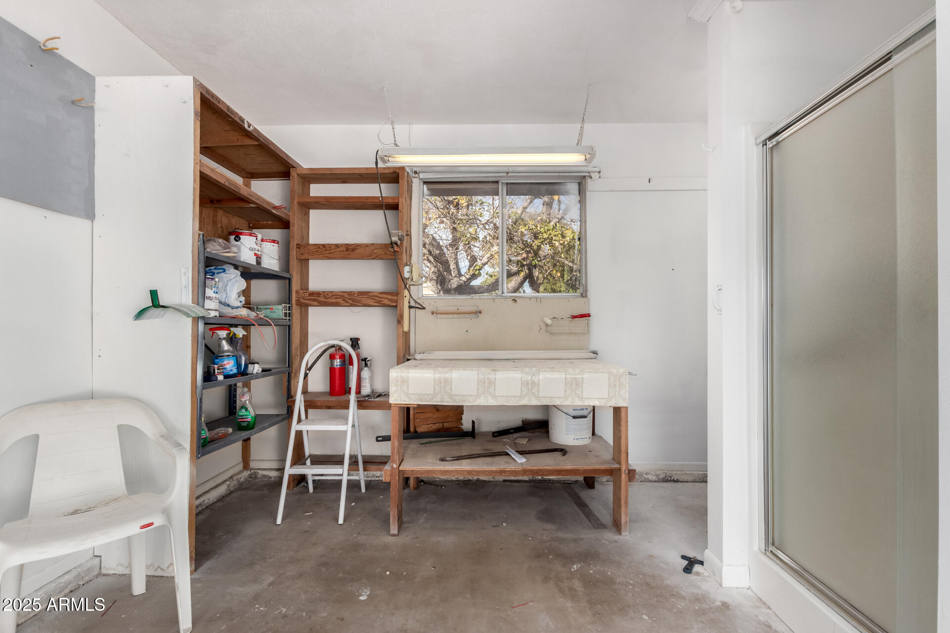 628 Leisure World Mesa, AZ 85206 - Photo 25 of 51 a living room with furniture a window and a table