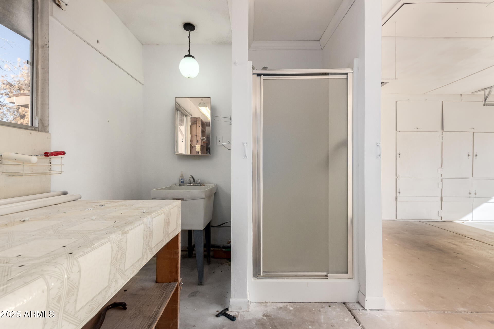 628 Leisure World Mesa, AZ 85206 - Photo 26 of 51 a bedroom with a bed and a table