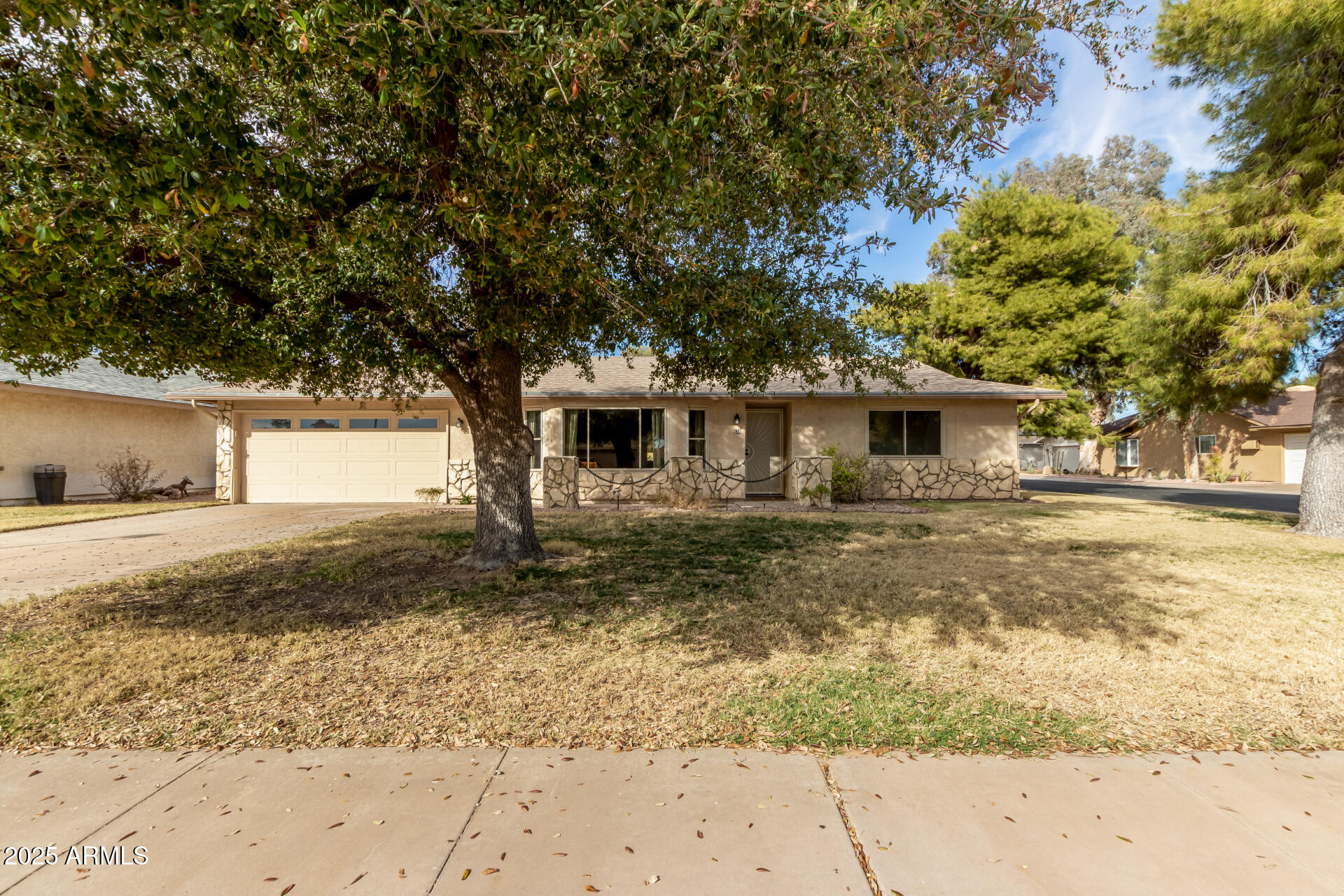 628 Leisure World Mesa, AZ 85206 - Photo 29 of 51 a front view of a house with a yard