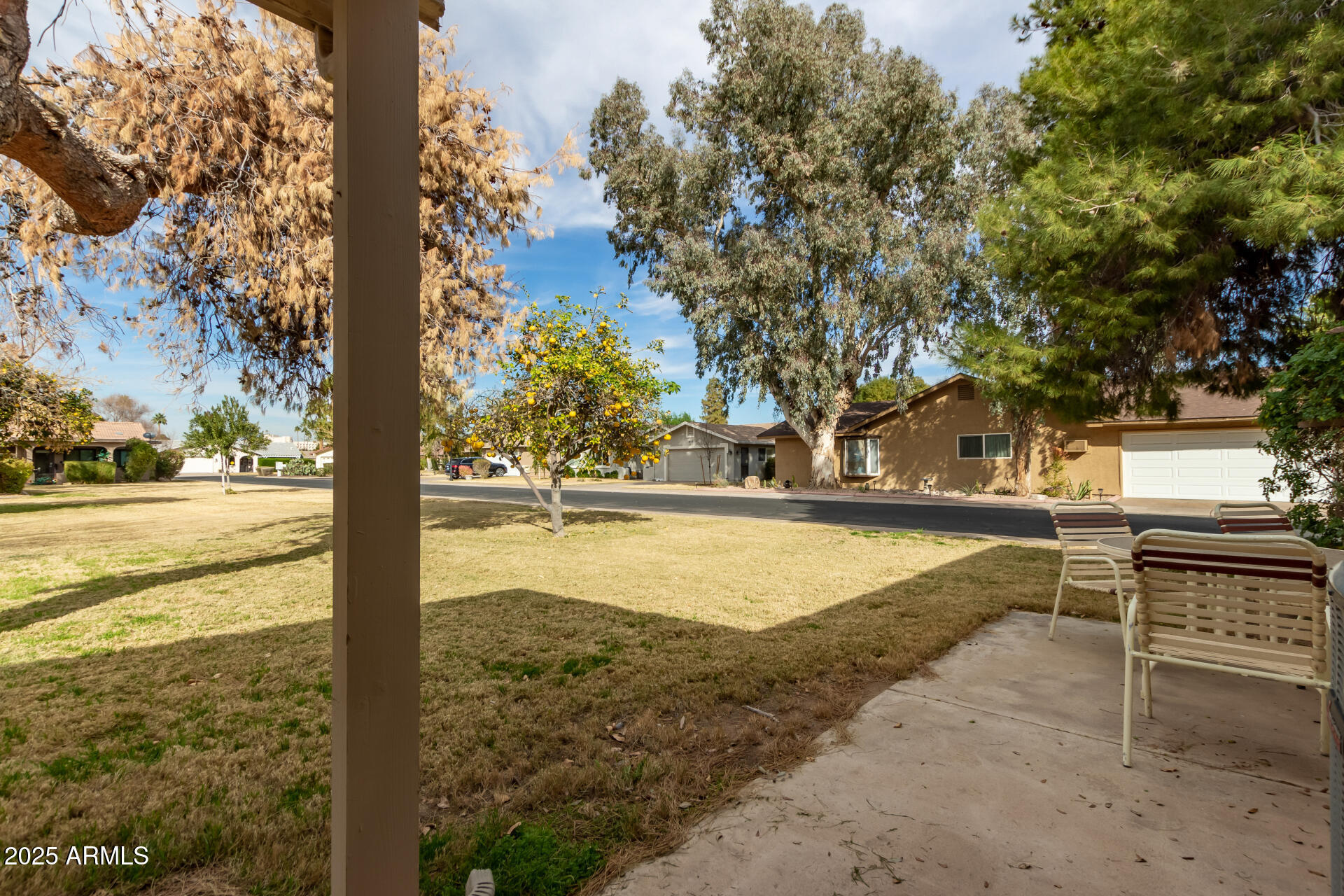 628 Leisure World Mesa, AZ 85206 - Photo 31 of 51 a view of a swimming pool with an outdoor space and seating area