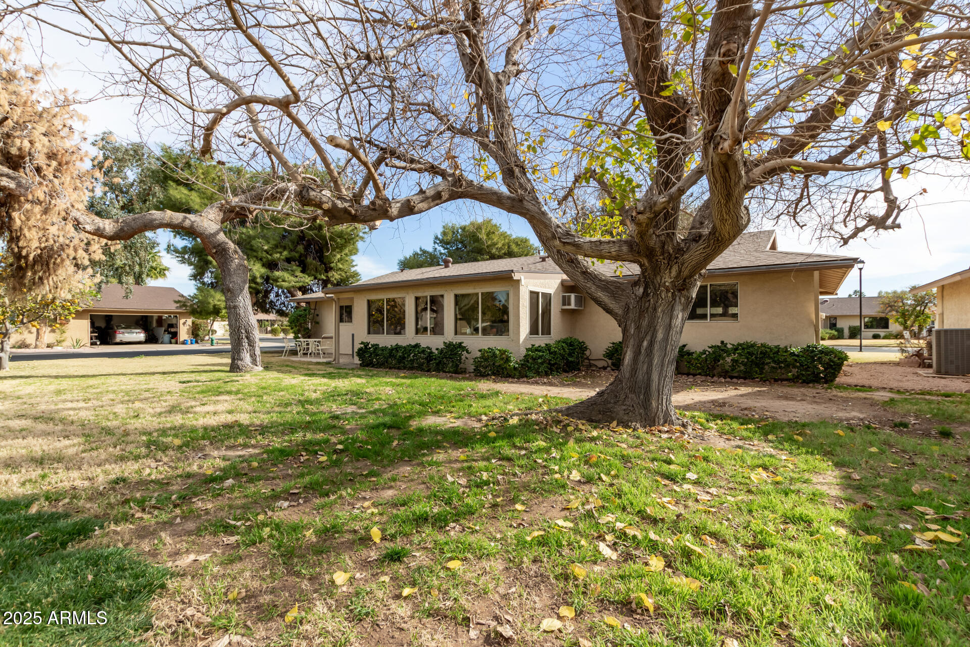 628 Leisure World Mesa, AZ 85206 - Photo 34 of 51 a front view of a house with a yard