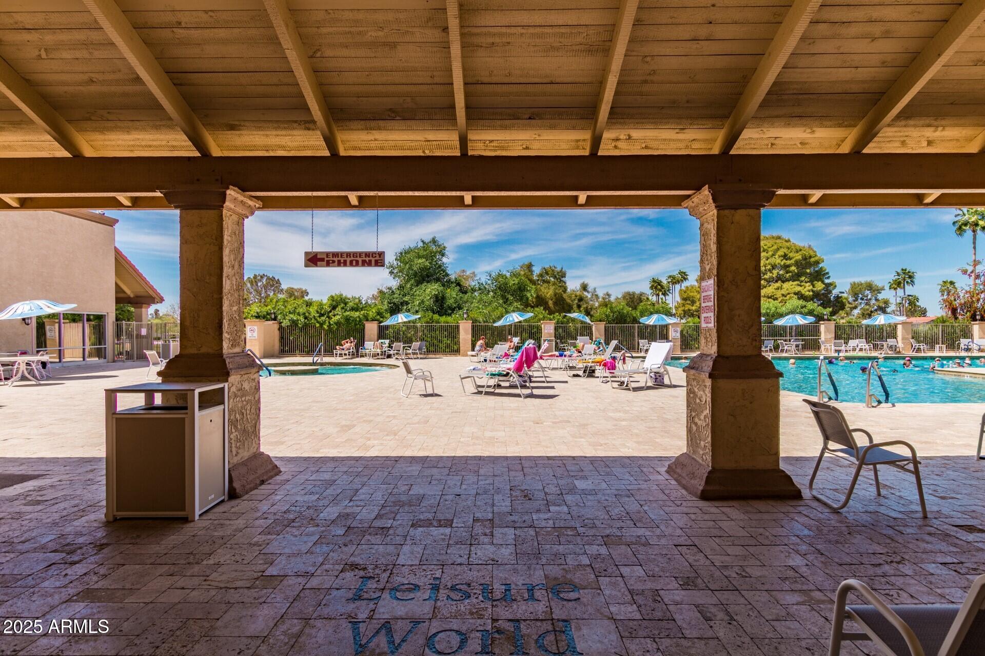 628 Leisure World Mesa, AZ 85206 - Photo 48 of 51 a view of a patio with a table and chairs