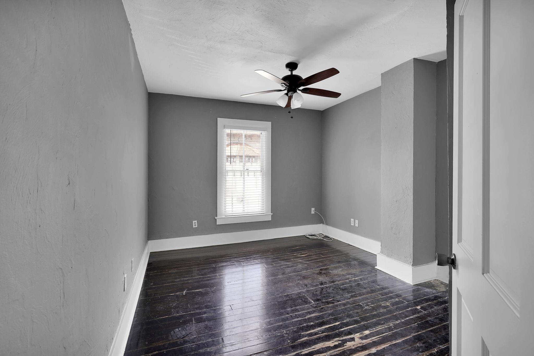 75 Cedar Street St. Augustine, FL 32084 - Photo 26 of 56 a view of empty room with wooden floor and fan