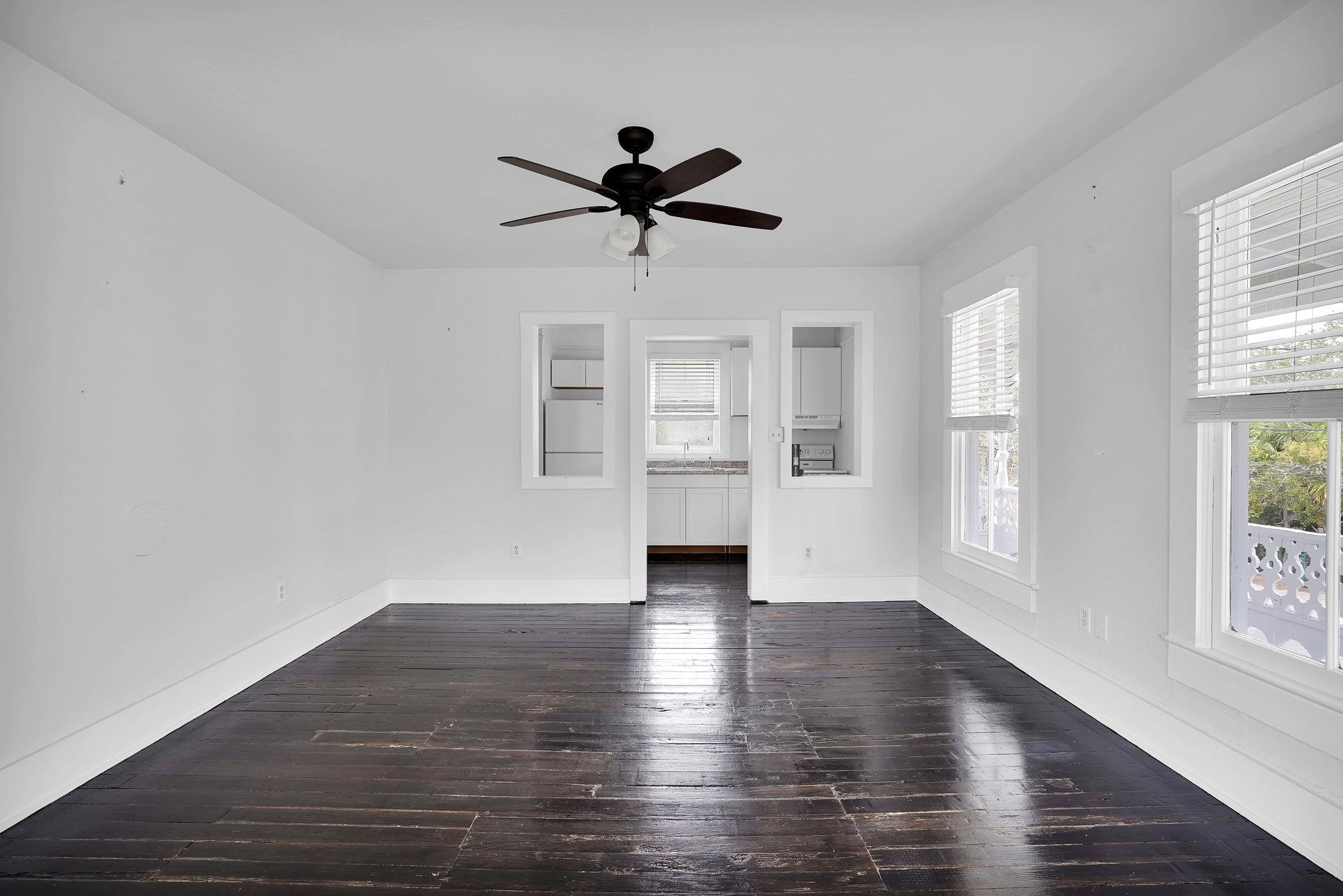 75 Cedar Street St. Augustine, FL 32084 - Photo 30 of 56 a view of empty room with wooden floor and window